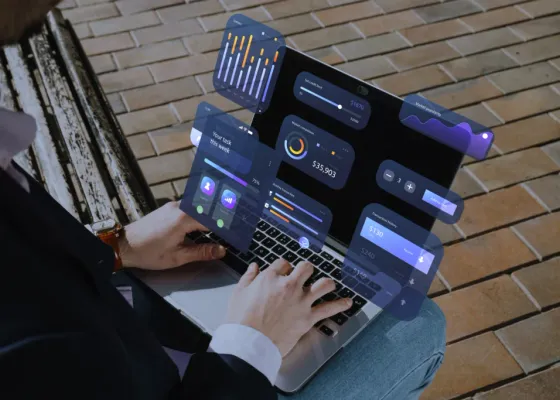 Laptop showing multi-tenant B2B SaaS architecture wireframes